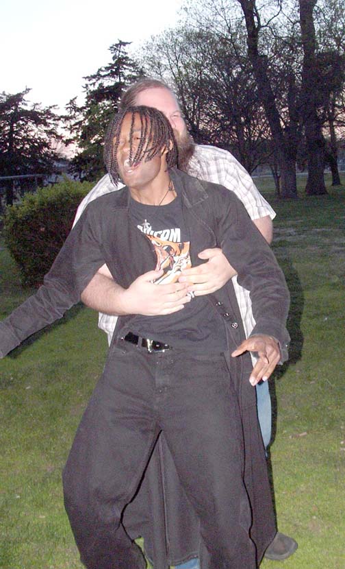 Hrothgar lifting Priest right OFF the ground.